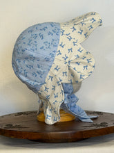 Load image into Gallery viewer, Blue Floral &amp; Bows Petal Hat
